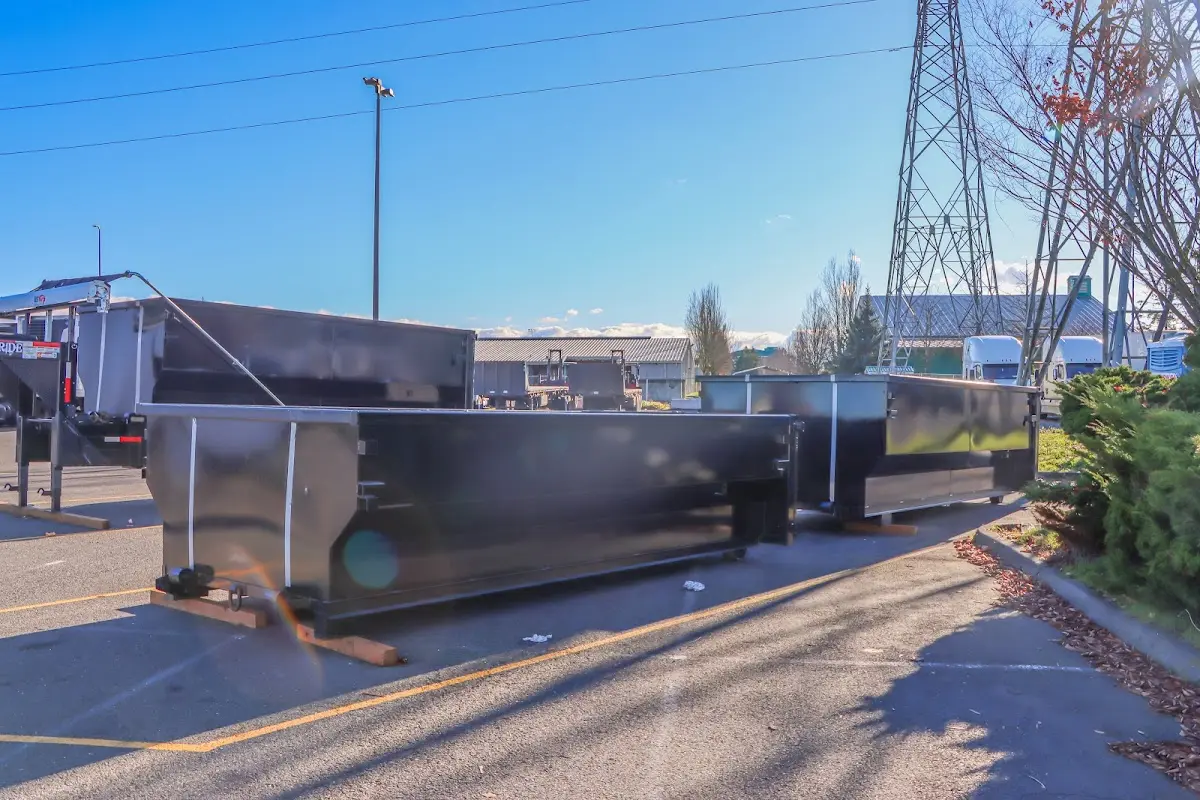 Roll-off dumpster ready for waste disposal at job site for Construction Dumpster Rental in Murrieta